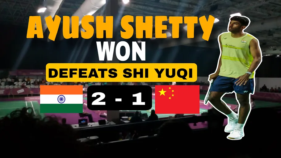 Ayush Shetty recent win as he celebrates his 2-1 victory over Shi Yu Qi with India and China flags displayed.