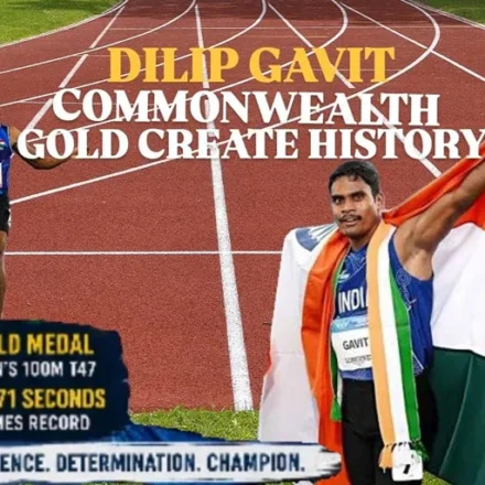 Dilip Gavit Commonwealth Gold celebration after winning the men's 100m T47 at the Commonwealth Games with a Games record of 10.71 seconds while holding the Indian flag.