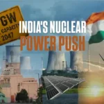 India’s nuclear power push towards 100 GW capacity by 2047, featuring nuclear reactors, solar panels, wind turbines and the Indian flag.